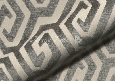 Art Deco stílusú geometriai mintás bútorszövet ezüstös